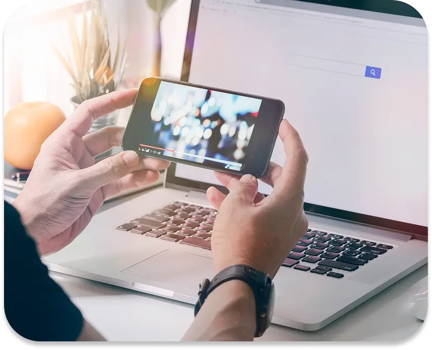 Person watching video on their phone.