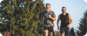 two persons who are running up the hills