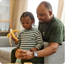 a person holding a child in their lap