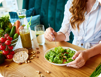 a person that is eating a salad